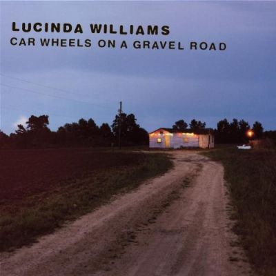 Car Wheels On A Gravel Road